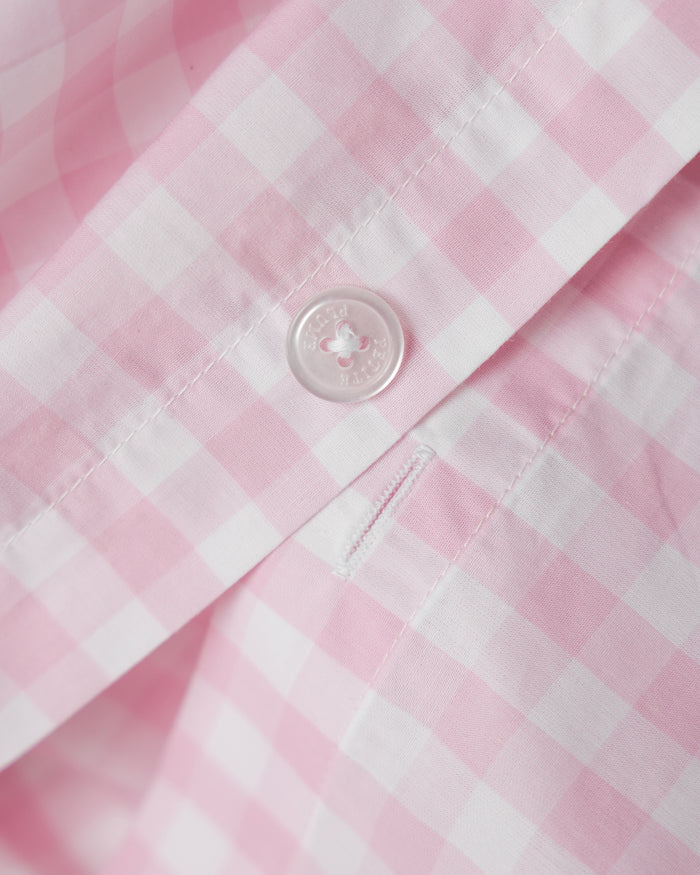 Blue and white checkered bedding set on a white background