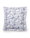 The Luxe Premium Cotton Euro Sham by Petite Plume features a percale square pillow with a white backdrop and intricate blue floral and foliage patterns. Reminiscent of botanical flowers, it displays detailed trees and birds, creating an elegant and classic look.