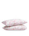 Two Luxe Premium Percale Pillow Cases in Pink Timeless Toile, featuring a pink floral toile pattern, stacked against a white background.