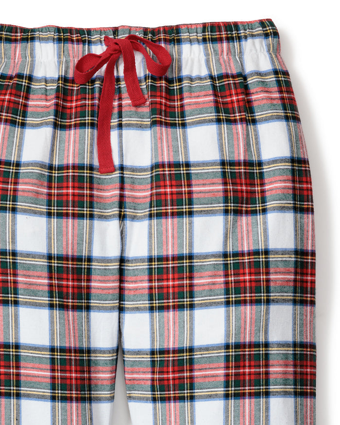 Enjoy ultimate comfort in Petite Plumes Mens Brushed Cotton Pants in Balmoral Tartan. These red plaid pants, made from lightweight brushed twill, feature horizontal and vertical red, green, and white stripes. An elastic waistband with a red drawstring bow adds to their cozy design.