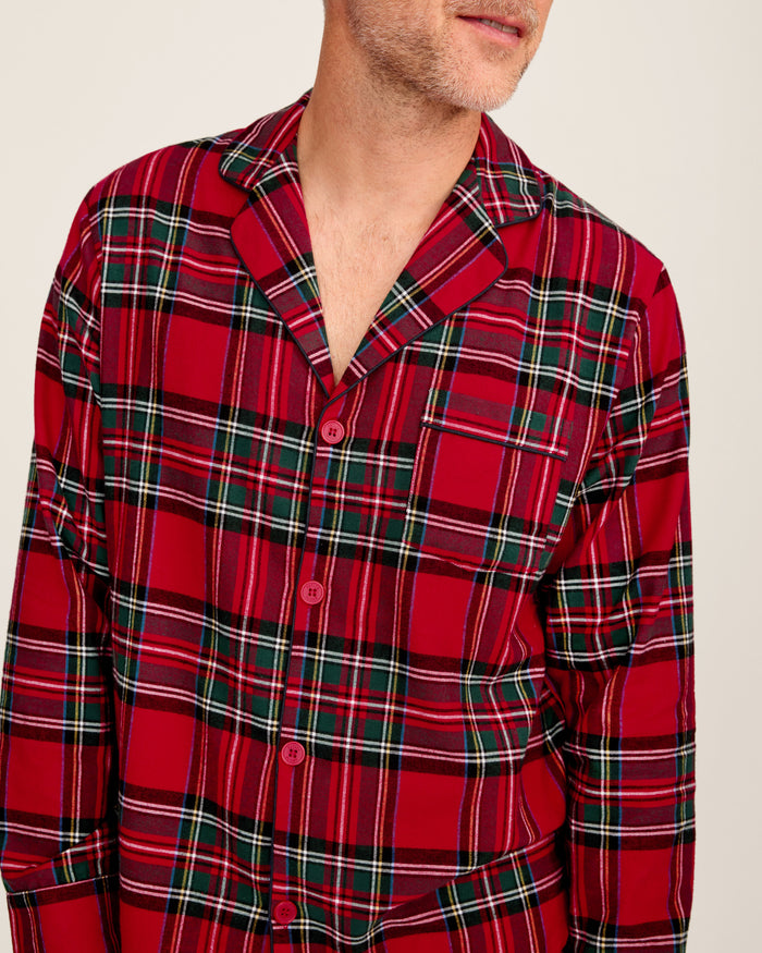 The Men's Brushed Twill Pajama Set in Imperial Tartan features a red plaid design with green, white, and black stripes, a button-up long-sleeve top with a chest pocket, and matching pants, displayed neatly on a white background.