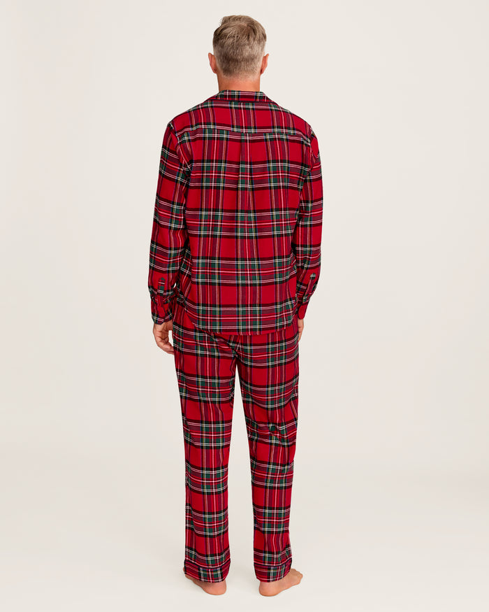 The Men's Brushed Twill Pajama Set in Imperial Tartan features a red plaid design with green, white, and black stripes, a button-up long-sleeve top with a chest pocket, and matching pants, displayed neatly on a white background.