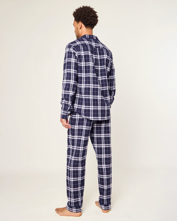 The Men's Brushed Twill Pajama Set in Oxford Tartan includes a two-piece navy and white plaid design with a long-sleeved button-up shirt featuring a chest pocket and matching drawstring pants.