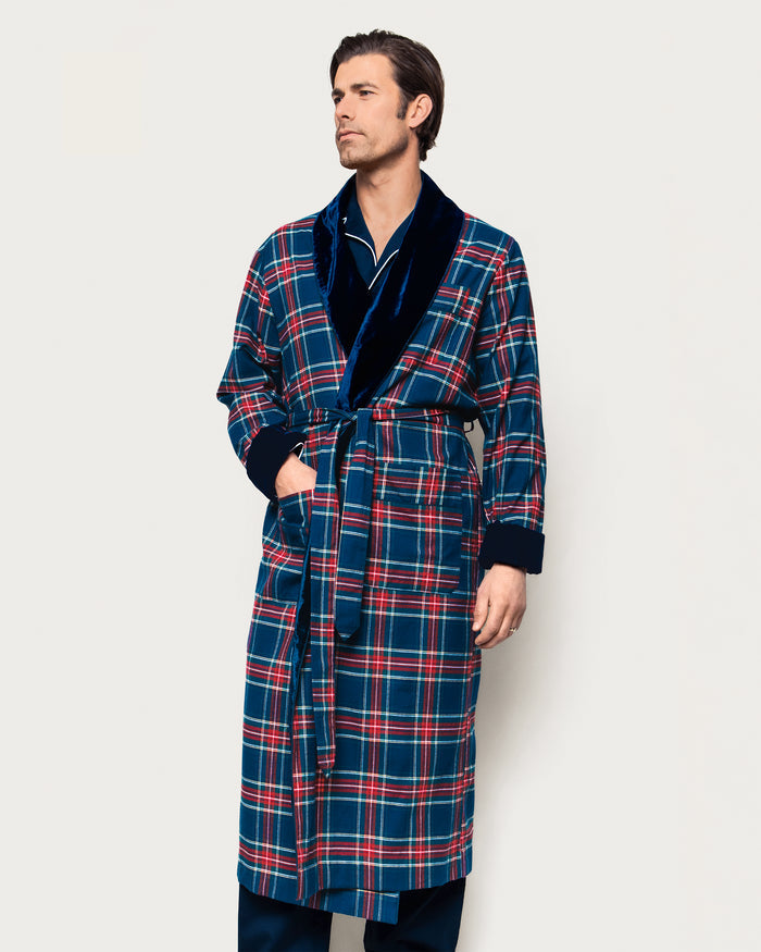 Close-up of the Mens Brushed Cotton Velvet Trim Robe in Windsor Tartan by Petite Plume, showcasing soft flannel fabric with red, green, yellow, and blue plaid across 100% cotton. Features include a tied belt and dark navy velvet collar and cuffs for a luxurious blend of textures and colors.