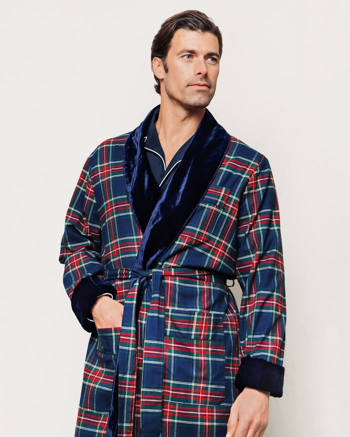 Close-up of the Mens Brushed Cotton Velvet Trim Robe in Windsor Tartan by Petite Plume, showcasing soft flannel fabric with red, green, yellow, and blue plaid across 100% cotton. Features include a tied belt and dark navy velvet collar and cuffs for a luxurious blend of textures and colors.