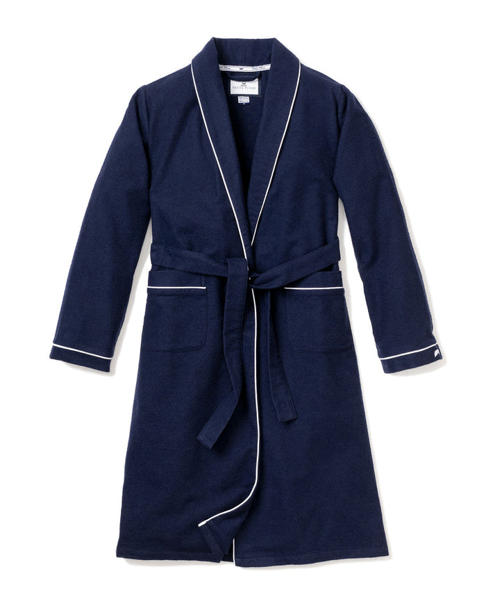 The Petite Plume Mens Flannel Robe, navy with white piping, features two front pockets and a waist belt, displayed against a plain white background.