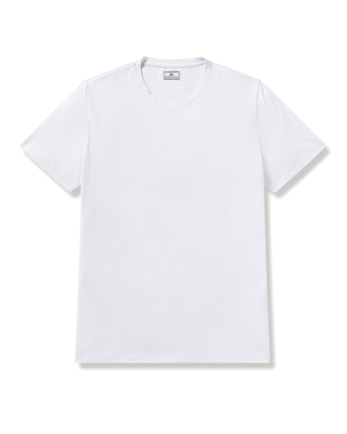 The Mens Pima Crew Neck Short Sleeve Top in White by Petite Plume is crafted from luxurious Peruvian Pima cotton. Its simple design with short sleeves and a round neckline exudes effortless style and embodies the comfort of a premium jersey knit.
