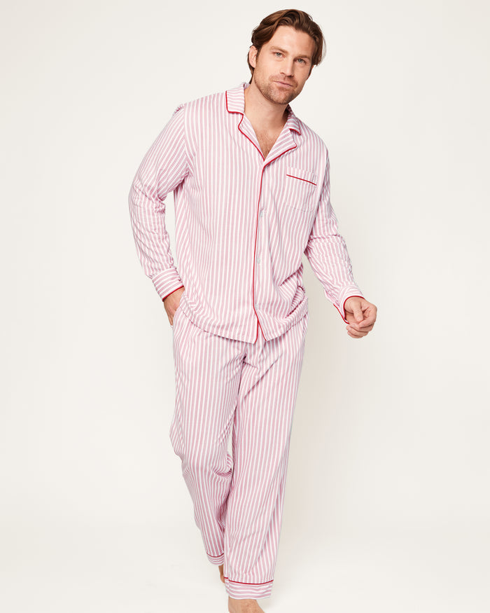 This close-up features the Mens Pima Pajama Top by Petite Plume in Antique Red Ticking. The luxurious yarn-dyed Peruvian Pima cotton showcases vertical red and white stripes with a visible button and pocket outlined in red piping, ensuring softness and comfort for restful nights.