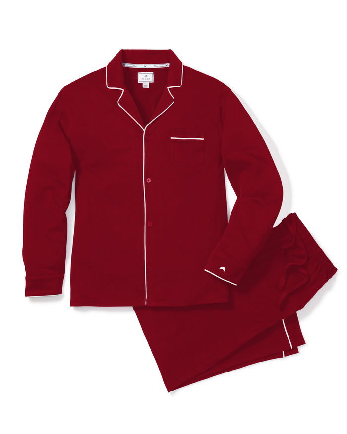 The Mens Pima Pajama Set in Bordeaux by Petite Plume is crafted from Peruvian Pima cotton with white piping. It includes a long-sleeve button-up top with a chest pocket and matching pants featuring an elastic waistband, offering soft, luxurious comfort for restful nights.