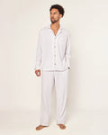 The Men's Pima Pajama Set in Camel Ticking features beige and white stripes, a button-up long-sleeve top with a chest pocket, and matching drawstring pants, displayed flat on a white background.