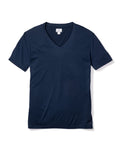 The Mens Pima V-Neck Top in Navy by Petite Plume is showcased on a white background. This luxurious Peruvian Pima cotton shirt has short sleeves and a discreet inner collar tag.