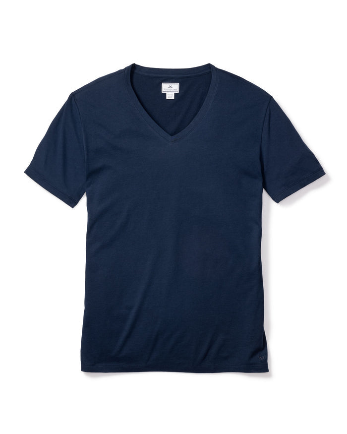 The Mens Pima V-Neck Top in Navy by Petite Plume is showcased on a white background. This luxurious Peruvian Pima cotton shirt has short sleeves and a discreet inner collar tag.