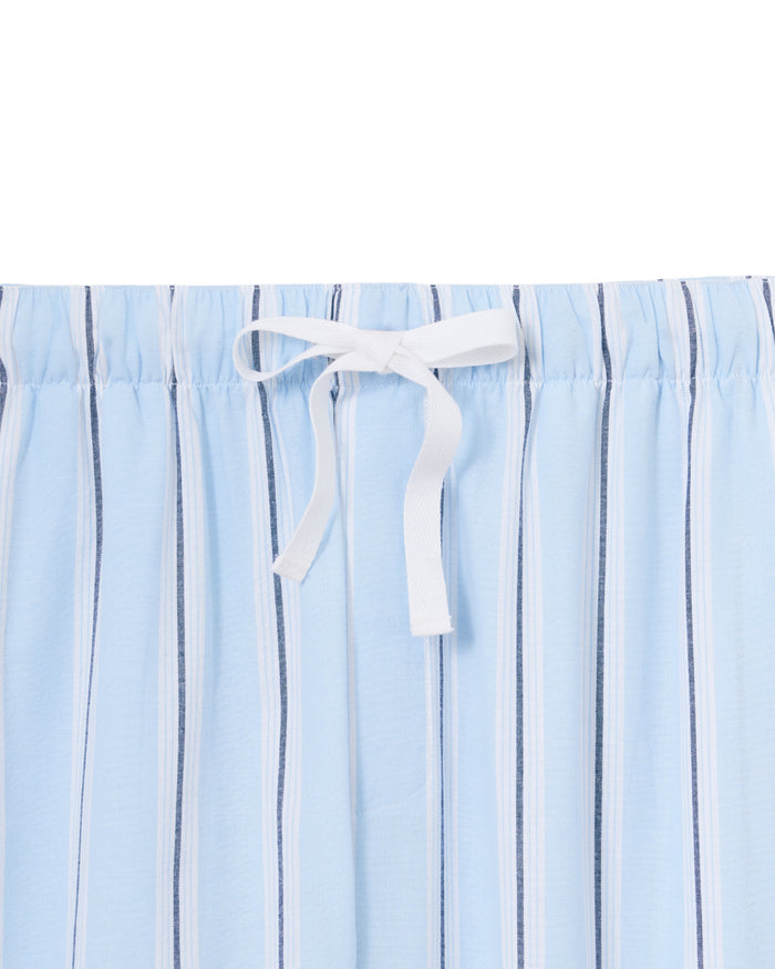 Close-up of the waistband of the Men’s Twill Pajama Pants in Coastal Stripe, featuring light blue fabric with vertical white and dark blue stripes and a white drawstring tied in a bow.
