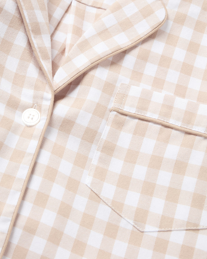 The Men's Twill Pajama Set in Camel Gingham includes a long-sleeve, button-up top with a chest pocket and matching pants, both in a beige and white gingham check pattern.