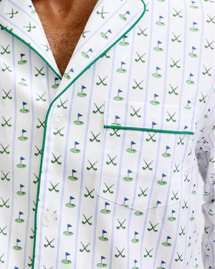 Men's Twill Pajama Set in Fairway Stripe, featuring a small green anchor pattern, green piping, chest pocket, and elastic waistband with green drawstring pants. The set is displayed neatly on a white background.