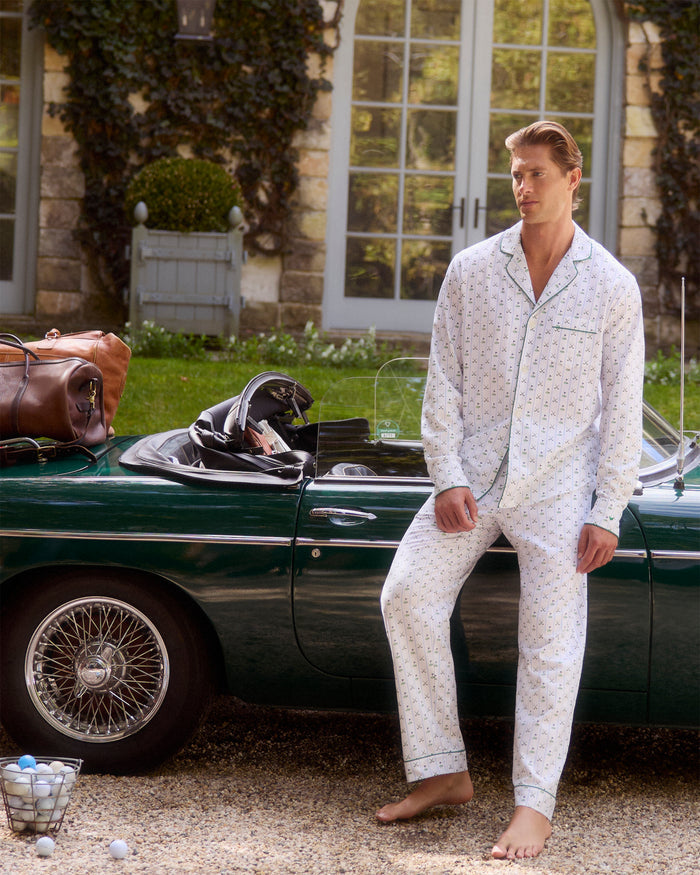 Men's Twill Pajama Set in Fairway Stripe, featuring a small green anchor pattern, green piping, chest pocket, and elastic waistband with green drawstring pants. The set is displayed neatly on a white background.