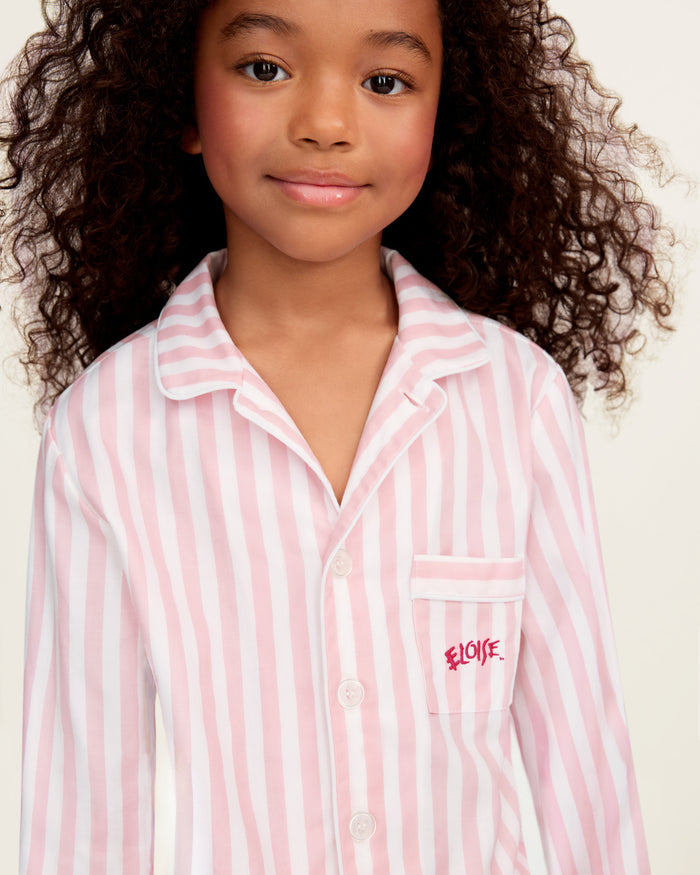 Petite Plume x Eloise Kid's Twill Pajama Set in Eloise Classic Stripe features pink and white stripes.