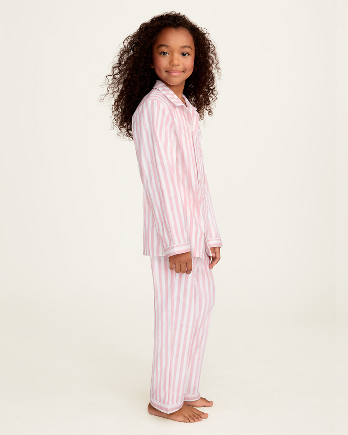 Petite Plume x Eloise Kid's Twill Pajama Set in Eloise Classic Stripe features pink and white stripes.