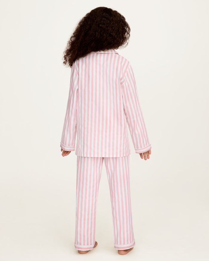 Petite Plume x Eloise Kid's Twill Pajama Set in Eloise Classic Stripe features pink and white stripes.