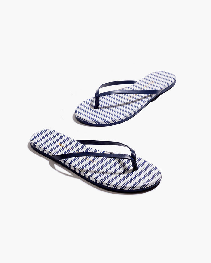 The Petite Plume x TKEES Lily Sandal in Navy French Ticking features blue and white horizontal stripes with dark blue straps, displayed side by side on a white background.