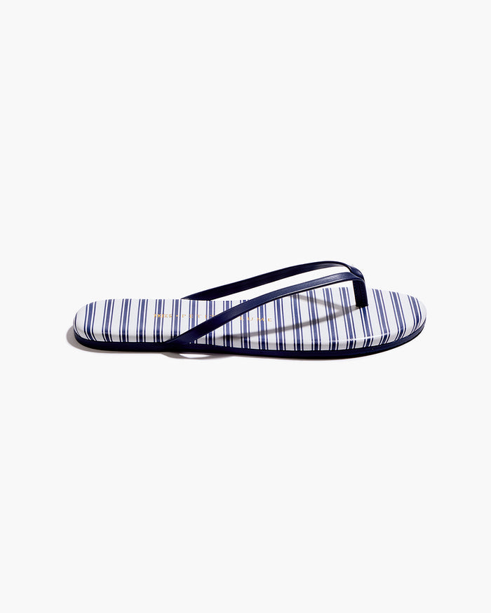 The Petite Plume x TKEES Lily Sandal in Navy French Ticking features blue and white horizontal stripes with dark blue straps, displayed side by side on a white background.