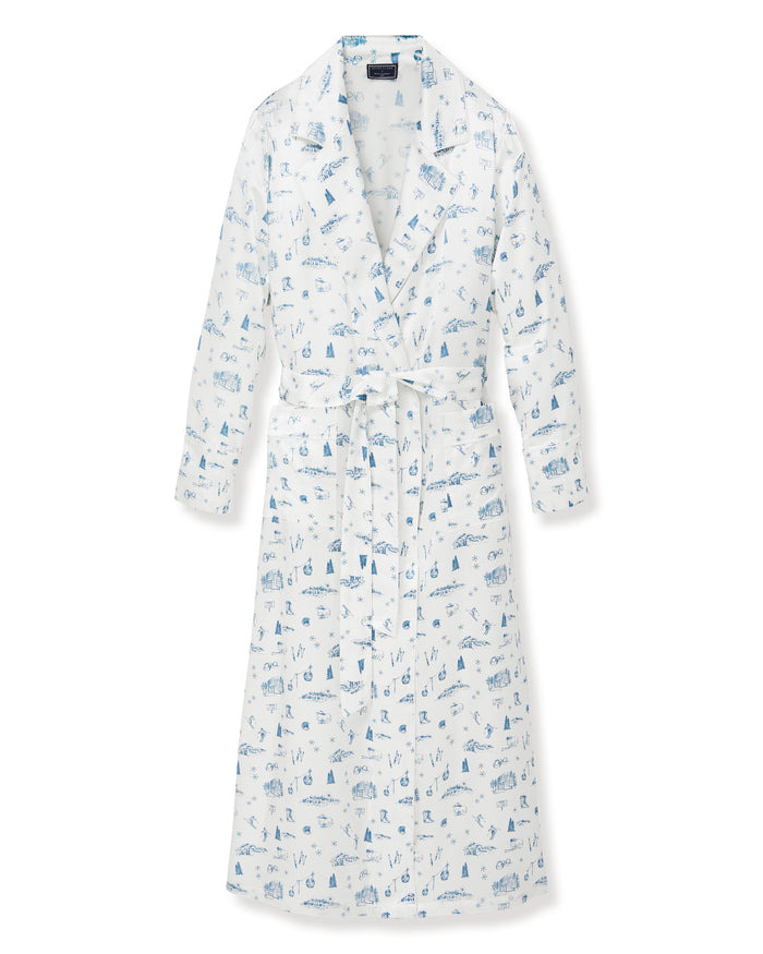 Petite Plume x White Elephant Women’s Silk Robe with long sleeves, a notched collar, and a waist tie. Crafted from silk, the robe features a blue nautical print adorned with sailboats, lighthouses, and seagulls scattered throughout.