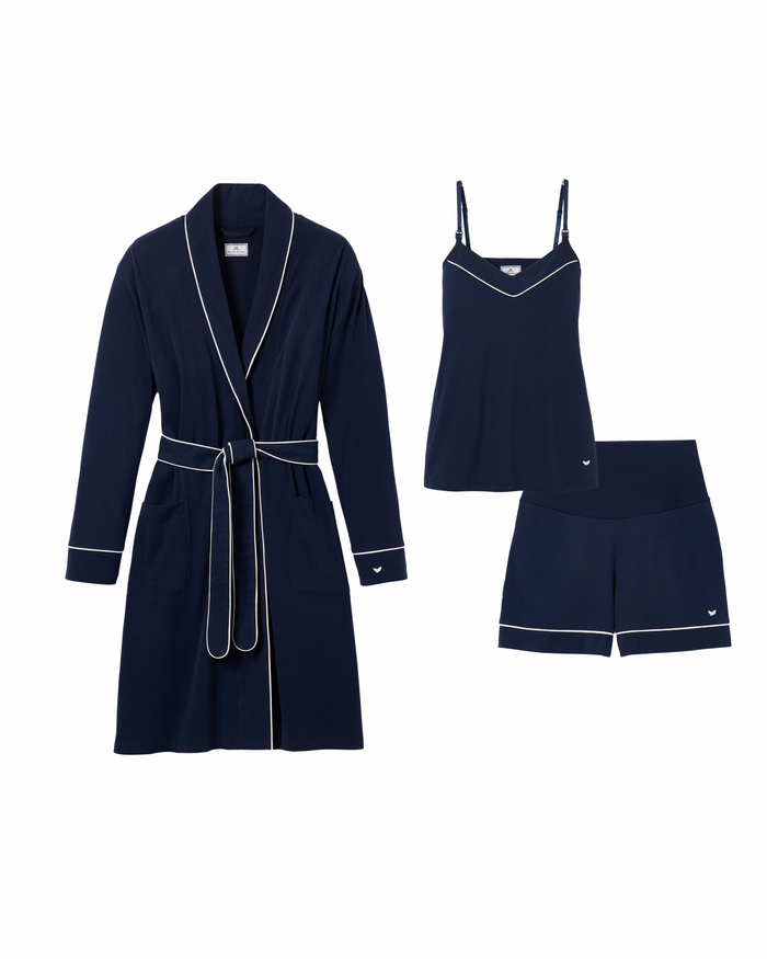 The Must Have Maternity Set in Navy by Petite Plume is a perfect summer nights sleepwear. It includes a long-sleeve robe with white piping and belt, a sleeveless camisole with spaghetti straps, and matching shorts—all in lightweight, breathable fabric for a stylish gift presentation.