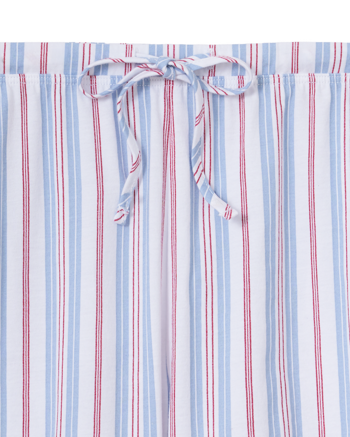 Close-up of The Olivia Wide Leg Lightweight Pima Pajama Set in Vintage French Stripes, showcasing light blue pajama pants with vertical red and blue stripes and a drawstring tie at the waist.