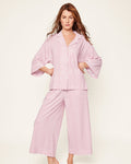 Featuring the Petite Plume Olivia Pajama Set in Antique Red Ticking, this shirt is crafted from luxurious Peruvian Pima cotton with an embroidered logo on its sleeve and a classic white button front design.