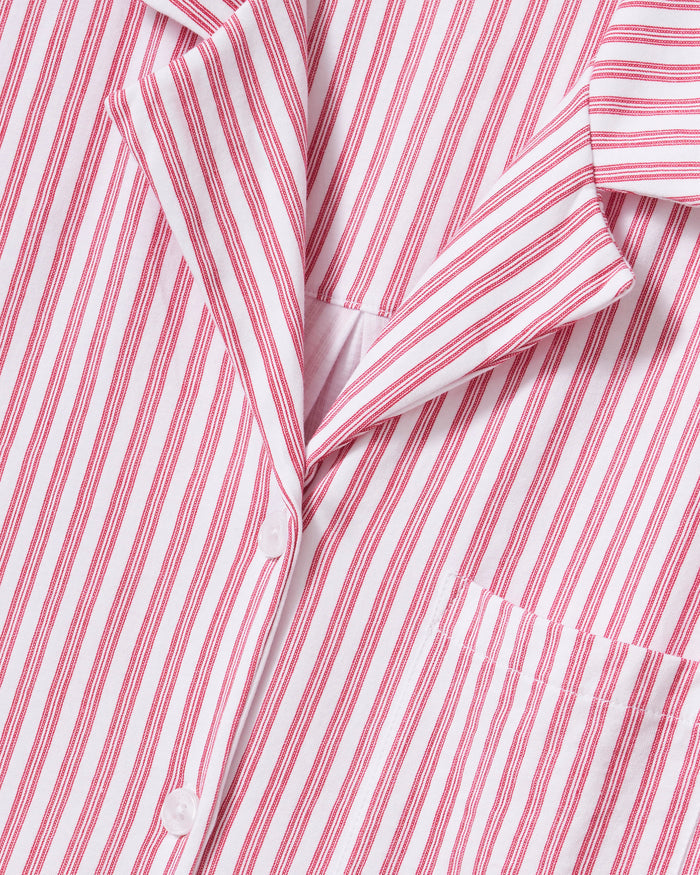 Featuring the Petite Plume Olivia Pajama Set in Antique Red Ticking, this shirt is crafted from luxurious Peruvian Pima cotton with an embroidered logo on its sleeve and a classic white button front design.