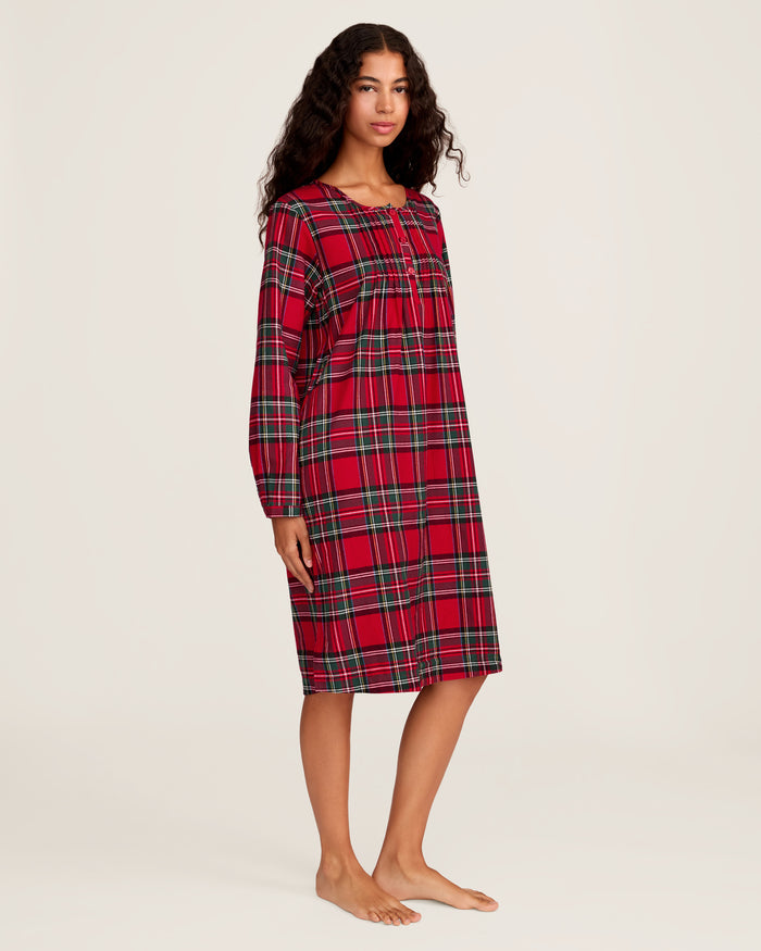 The Women's Brushed Twill Beatrice Nightgown in Imperial Tartan features long sleeves, a knee-length cut, a red, green, and black plaid design, chest buttons, and a round neckline.