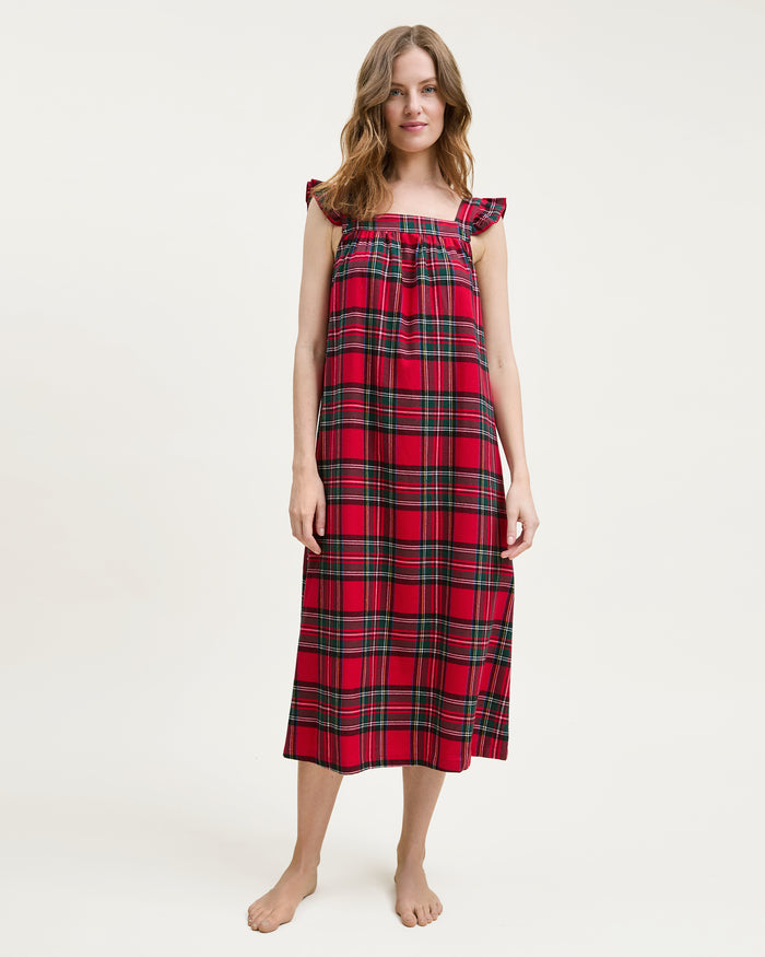 The Women's Brushed Twill Clara Nightgown in Imperial Tartan features a sleeveless red plaid design with green, yellow, and white stripes, ruffled shoulder straps, and a loose gathered bodice for a festive holiday look.