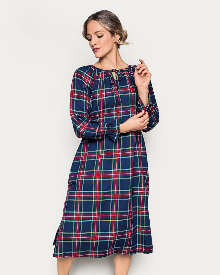 The Women's Brushed Twill Delphine Nightgown in Windsor Tartan is an ankle-length, long-sleeved nightgown with ruffled collar and cuffs, featuring a classic navy, red, and green plaid pattern.