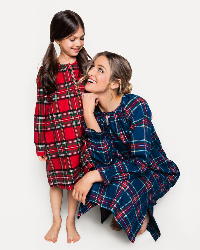 The Women's Brushed Twill Delphine Nightgown in Windsor Tartan is an ankle-length, long-sleeved nightgown with ruffled collar and cuffs, featuring a classic navy, red, and green plaid pattern.
