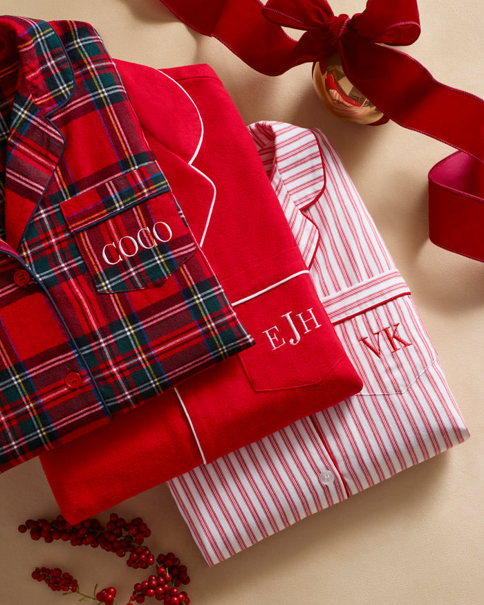 Women's Brushed Twill Pajama Set in Imperial Tartan features a red plaid button-up top with chest pocket and matching pants with a drawstring waist, detailed in green, white, and navy stripes for a classic look.