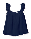 The Womens Gauze Celeste Top in Navy by Petite Plume flaunts a feminine silhouette with ruffled straps, a square neckline, and textured luxury cotton gauze. Loose-fitting and flowy, it epitomizes effortless elegance against a plain white backdrop.