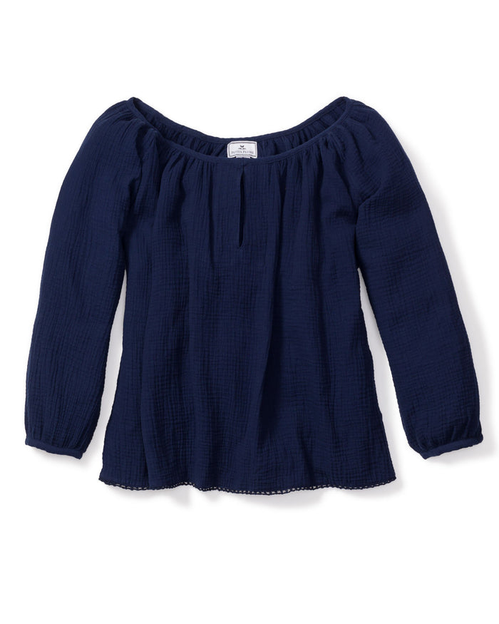 The Womens Gauze Willow Scoopneck Top in Navy by Petite Plume, from our Gauze Collection, is crafted from a textured cotton gauze fabric. Its off-the-shoulder design and flowy silhouette offer an elegant luxury loungewear option.