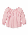 Discover the Womens Gauze Willow Scoopneck Top in Pink by Petite Plume—an elegant, long-sleeve blouse from our luxury Gauze Collection. Made from textured cotton gauze, it features a gathered neckline and a delicate keyhole opening for an airy, comfortable fit.