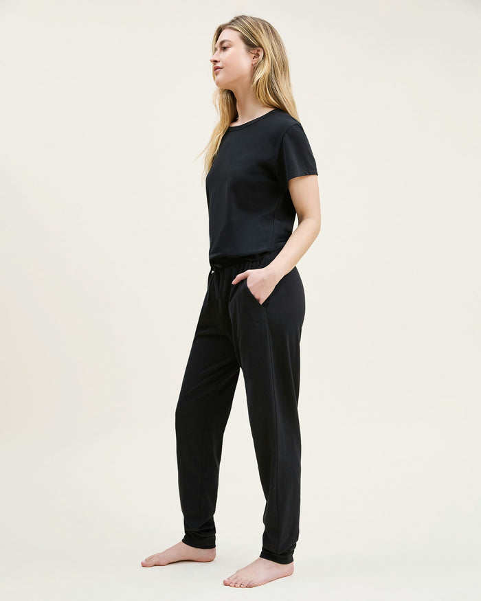 A black crew neck t-shirt made from pima cotton, displayed against a white background.
