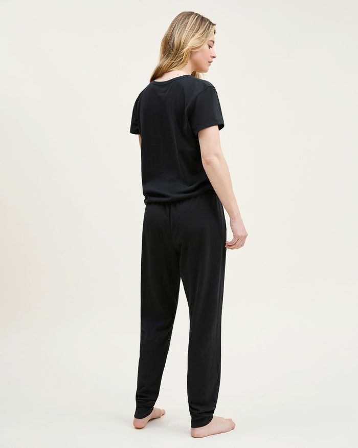A black crew neck t-shirt made from pima cotton, displayed against a white background.