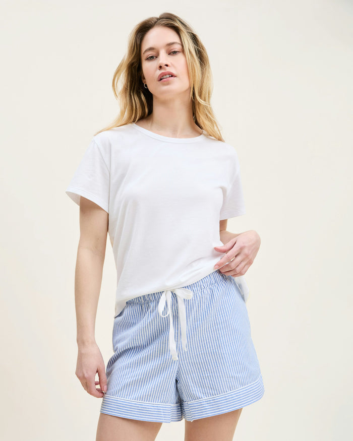 A white crew neck t-shirt made of pima cotton, displayed against a plain background.