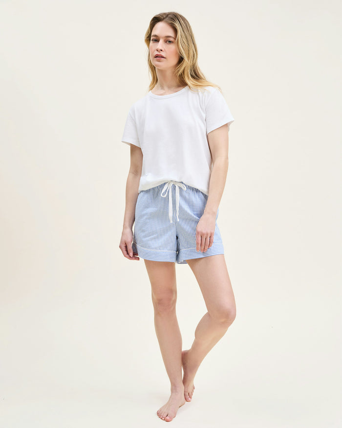 A white crew neck t-shirt made of pima cotton, displayed against a plain background.