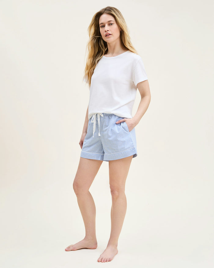 A white crew neck t-shirt made of pima cotton, displayed against a plain background.