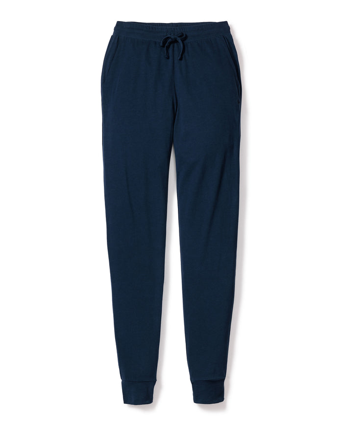 Petite Plumes Womens Pima Lounge Pants in navy, featuring an elastic waistband and drawstring, jersey knit material, side pockets, and cuffed ankles, laid flat on a white background.