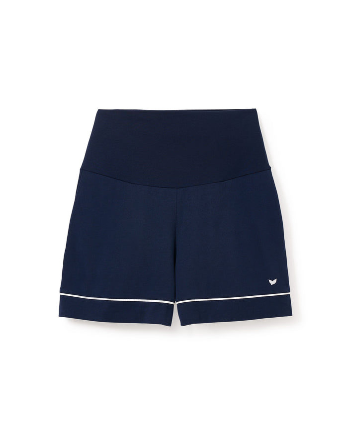 Petite Plumes Womens Pima Maternity Shorts in Navy feature a dark waistband for over-the-belly support, an embroidered leg logo, and subtle white piping at the hem, offering a simple yet sporty design ideal for your pregnancy journey.