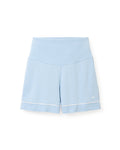 Petite Plumes Womens Pima Maternity Shorts in Periwinkle are light blue, high-waisted with a wide waistband and white trim. Designed for comfort during your pregnancy, they feature a small white logo on the lower left leg.
