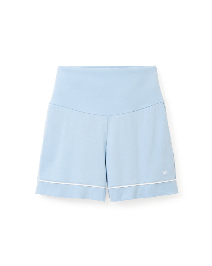 Petite Plumes Womens Pima Maternity Shorts in Periwinkle are light blue, high-waisted with a wide waistband and white trim. Designed for comfort during your pregnancy, they feature a small white logo on the lower left leg.