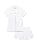 The Women's Pima Short Sleeve Short Set in White with Periwinkle Piping includes a collared button-up top with a chest pocket and matching shorts featuring an elastic waistband.