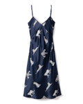 The Womens Silk Cosette Nightgown in Panthère de Nuit by Petite Plume is a navy blue nightdress with thin straps, made from Mulberry silk and featuring silver embroidered animals like leopards and monkeys.