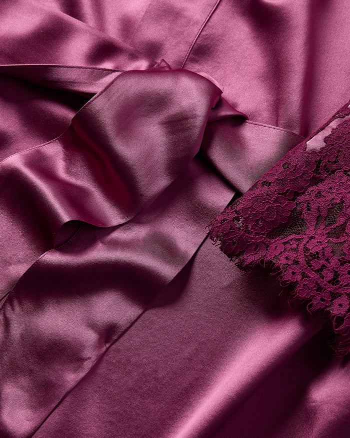 The Women's Silk Lace Robe in Rosewood features a matching belt and lace-trimmed sleeves, shown flat on a white background.